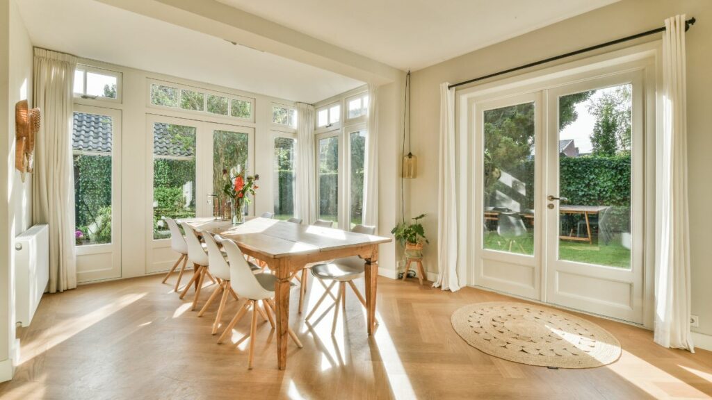 A window to wellness: how biophilia in interior design uses light and views to transform spaces 8 dining room big windows